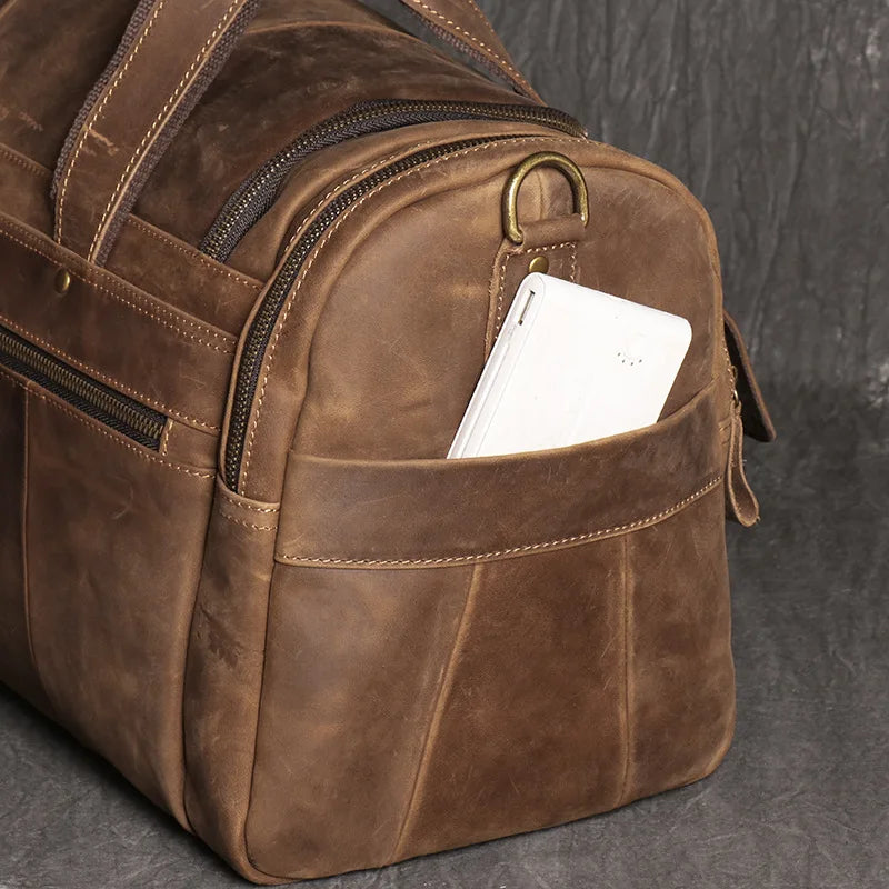 sac de voyage cuir homme en cuir véritable de vache pleine fleur finition crazy horse, sac de voyage vintage marron et noir pour homme, sac week-end cuir souple style duffle bag, sac de voyage homme bandoulière et porté main, sac de sport cuir élégant gym et déplacements professionnels, sac business voyage cuir premium, sac de voyage cuir robuste pour court séjour, sac homme cuir grande capacité doublure textile résistante, sac de voyage cuir authentique style rétro, travel bag leather men crazy horse cow l