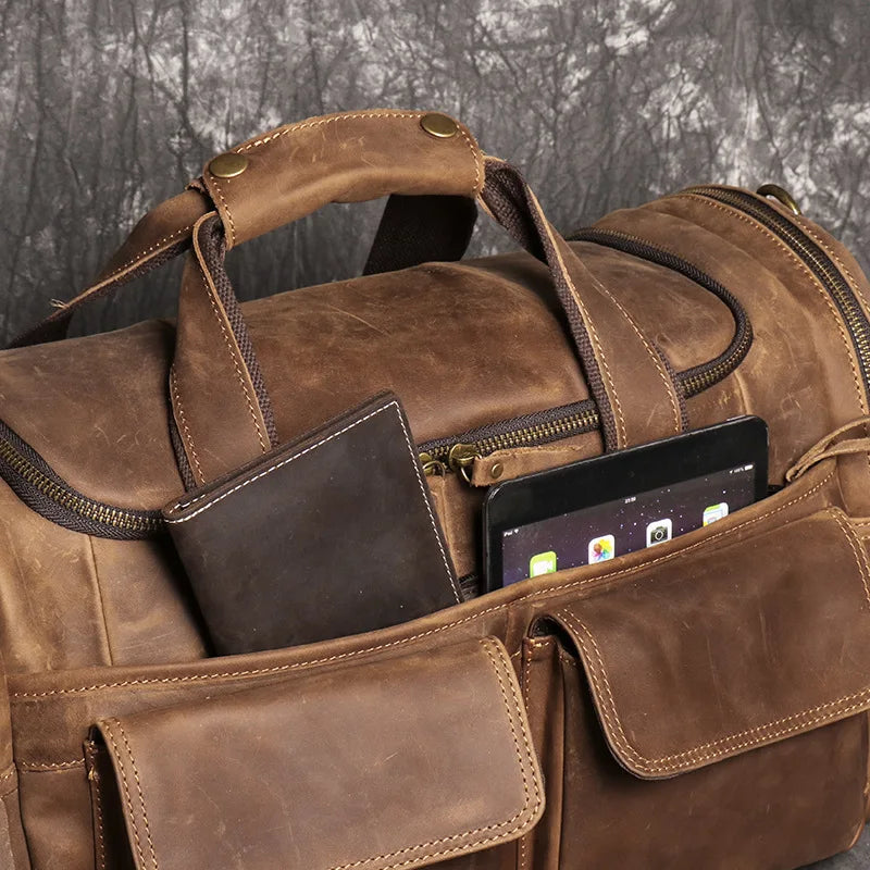 sac de voyage cuir homme en cuir véritable de vache pleine fleur finition crazy horse, sac de voyage vintage marron et noir pour homme, sac week-end cuir souple style duffle bag, sac de voyage homme bandoulière et porté main, sac de sport cuir élégant gym et déplacements professionnels, sac business voyage cuir premium, sac de voyage cuir robuste pour court séjour, sac homme cuir grande capacité doublure textile résistante, sac de voyage cuir authentique style rétro, travel bag leather men crazy horse cow l