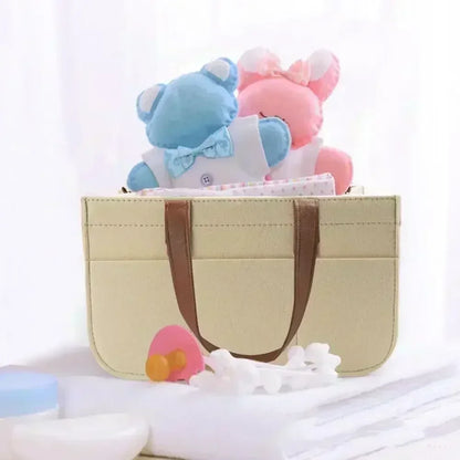 organisateur de poussette universel, sac de rangement pour poussette bébé, organisateur de poussette grande capacité, panier de rangement pliable pour poussette, sac suspendu pour poussette de voyage, organisateur de poussette en feutre élégant, rangement poussette pour couches et biberons, sac de poussette multifonction avec poches, organisateur de poussette portable avec poignées, rangement pratique pour accessoires de bébé, organisateur de poussette pour maman active, sac de rangement suspendu pour pouss
