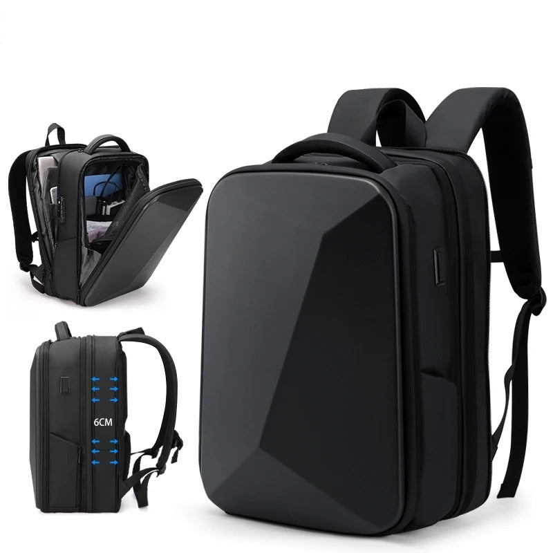 Sac-a-dos-antivol-nomad-shield, modèle Explorer Pro ouvert à 180° montrant son organisation pour ordinateur 15,6 pouces et tablette.